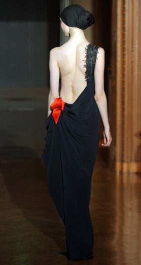 Illustration for article titled Christian Lacroix Couture Show A Blitz Of Somber Creativity For Dark Times